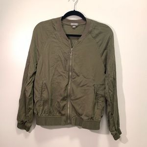 Green zip up jacket